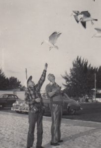 Richard and his Dad feed seagulls.