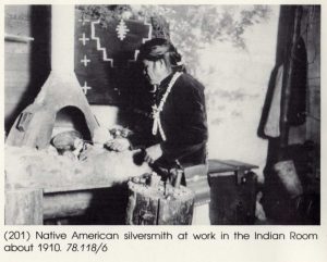 Native American silversmith at work